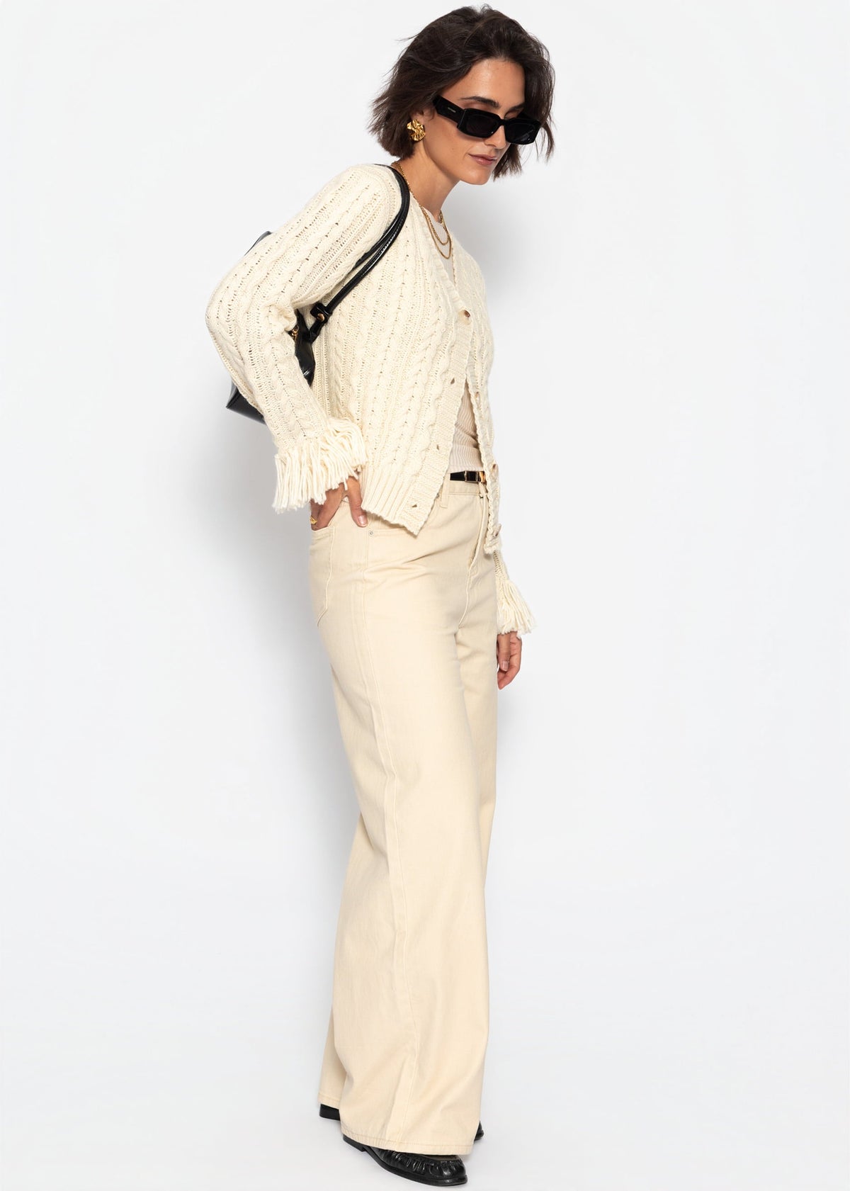 Cardigan en tricot torsadé avec bordures à franges - blanc cassé