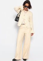 Cardigan en tricot torsadé avec bordures à franges - blanc cassé