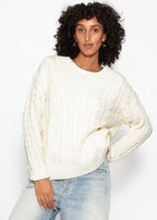 Pull en tricot torsadé avec décolleté en V - blanc cassé